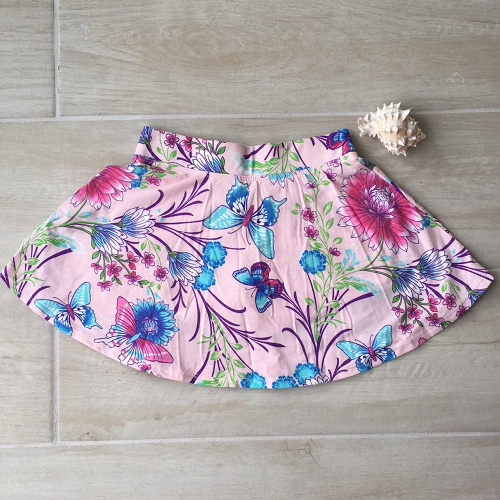 A short colorful flower print skirt